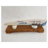 Richard Freeman colored scrimshaw of a canoe full