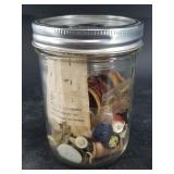 Mason jar filled with buttons