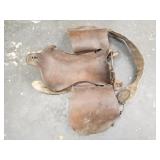 Antique leather saddle with steel frame