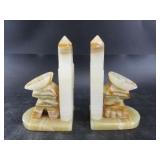 Pair of Mexican onyx bookends depicting a gaucho u