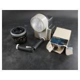 Variety of vintage camera accessories: Polaroid Wi