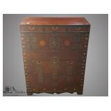 Oriental small dresser with many drawers and embel