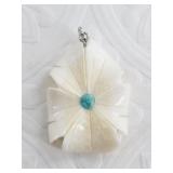 Dennis Pungowiyi walrus ivory flower with a turquo