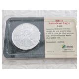 2002 Silver Eagle in a Littleton coin package