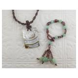 2 Pieces of jewelry: a glass and stone bracelet, a