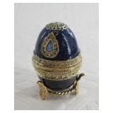 An enameled bejeweled ring dish with matching stan