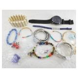 Variety of fashion bracelets and an NYK brand wris