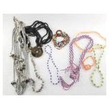 Assortment of fashion jewelry, materials include: