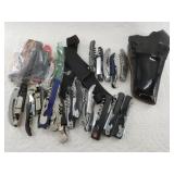 Large lot of assorted knives, holsters, etc.