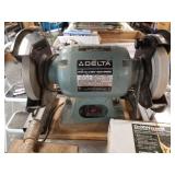 Delta model 23-880 8' bench grinder on a wood stan