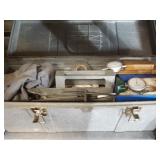 Large tool box filled with an assortment of tools