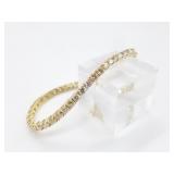 14kt gold and Diamond tennis bracelet. This is com