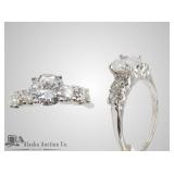 14kt White gold and diamond ring, center diamond i