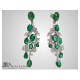 Emeral and diamond pair of earrings set in platinu