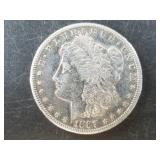 Morgan silver dollar:  1887 S cleaned and polished