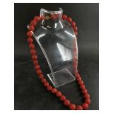 Oriental carved wood bead necklace with an ornate