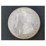 Morgan silver dollar:  1884 S