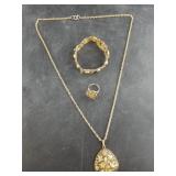 Vintage necklace and ring with carved face, and an