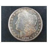 Morgan silver dollar:  1878 S  AU or better