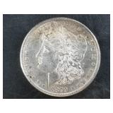Morgan silver dollar:  1879 S