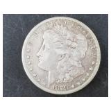 Morgan silver dollar:  1879 CC, It was improperly