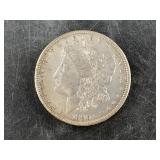 Morgan silver dollar:  1890 CC