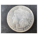 Morgan silver dollar:  1887 S