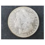 Morgan silver dollar:  1887 O