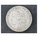 Morgan silver dollar:  1886 S