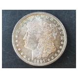 Morgan silver dollar:  1881 Mid mint state or bett