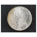 Morgan silver dollar:  1881 S AU or better