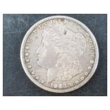 Morgan silver dollar:  1883 S