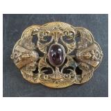 Beautiful Art Nouveau brooch with a polished caboc