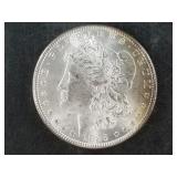 Morgan silver dollar:  1885 Low mint state or bett