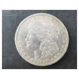 Morgan silver dollar:  1886 O