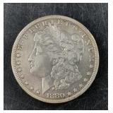Morgan silver dollar:  1880 CC