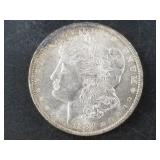 Morgan silver dollar:  1884 O