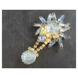 Vintage blue rhinestone brooch attributed to Julia
