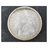 Morgan silver dollar:  1886 O