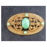 Beautiful Art Nouveau brooch with a polished caboc
