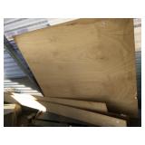 Lot with several pieces of plywood and an 80' cher