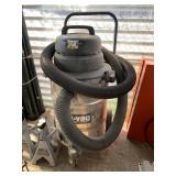 6 1/2 HP shop vac on rolling stand with hose