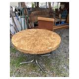 Mid century round table with 1 leaf, veneer is mad