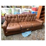 Vintage brown leather couch, condition is used but