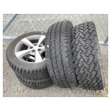 4 tires, various sizes, 2 are on rims