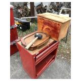 Bottom half of a tool box, several storage contain
