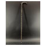 Cane made with segments of fluted water buffalo ho