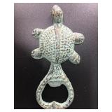 Adorable cast iron turtle shaped bottle opener. It