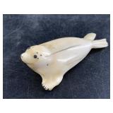 Fred Pushruk rare walrus ivory carving of a seal w