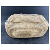 Unusual N.W. Alaskan grass basket with an oval sha